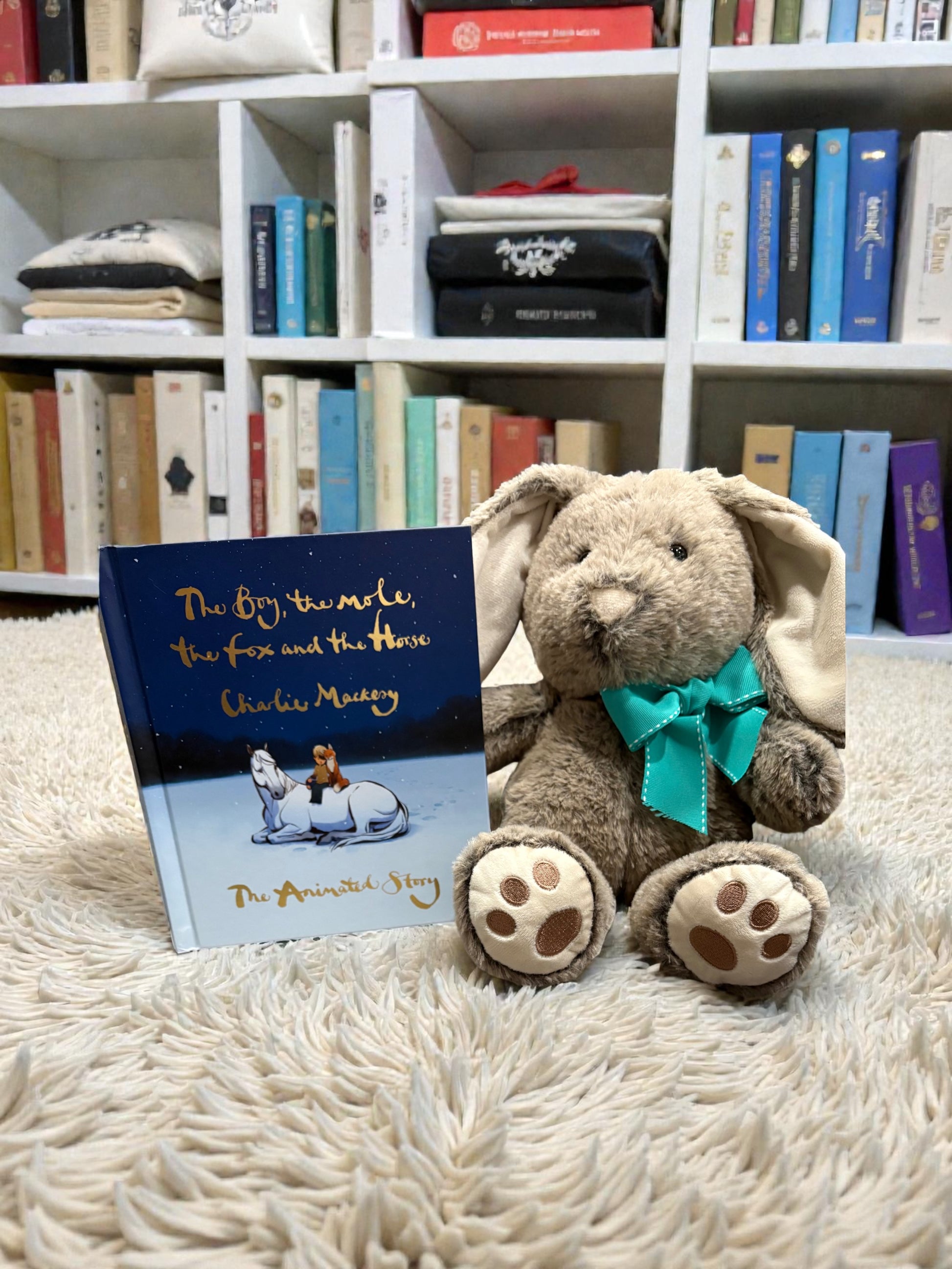 14 inch personalized bunny plush shown next to book for size reference